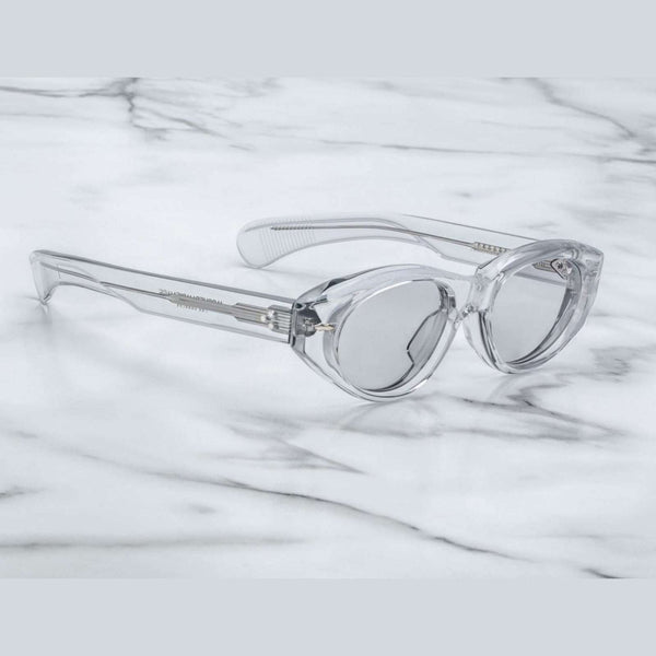 משקפי שמש שקופים Jacques Marie Mage KRASNER עם מסגרת פלסטיק שקופה והגנת UVA/UVB.