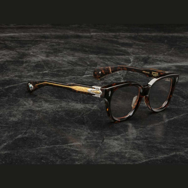 משקפי שמש מנומרות Jacques Marie Mage MOJAVE עם מסגרת פלסטיק ועיצוב ייחודי; הגנה מפני UVA/UVB וכוללות רפידות אף מתכווננות.