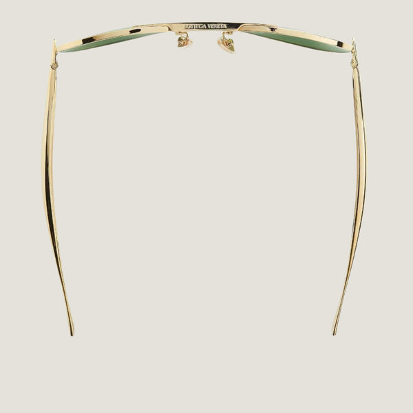 משקפי שמש דגם טייסים BOTTEGA VENETA, מסגרת זהב עדשות ירוק כהה, הגנה UV מלאה.