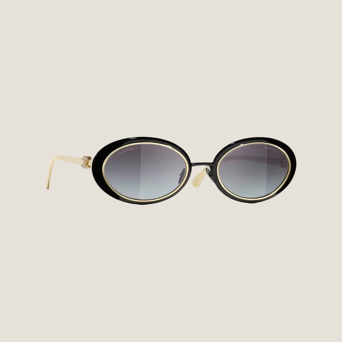 Image of CHANEL sunglasses with elegant design and UV protection.
